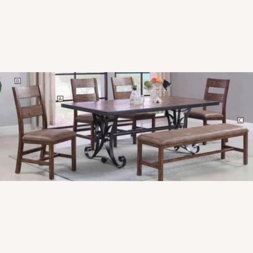 Used Solid Wood with Metal Accent Dining Group for sale on AptDeco