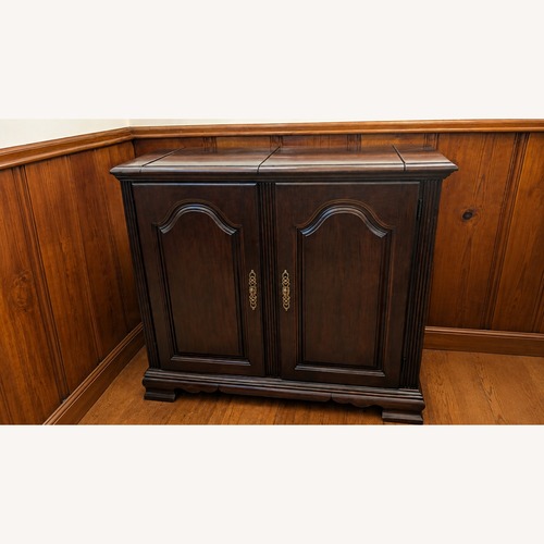 Used Vintage Wood Bar Liquor Cabinet for sale on AptDeco