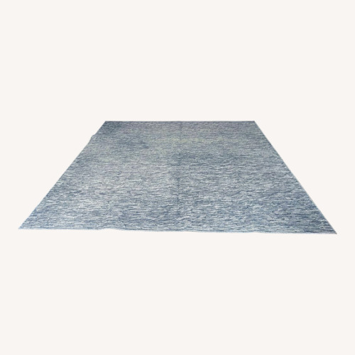 Used Modern Blue and Beige Area Rug Textured Pattern for sale on AptDeco