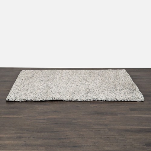 Used IKEA Vindum Modern Beige and Gray Speckled Rug for sale on AptDeco
