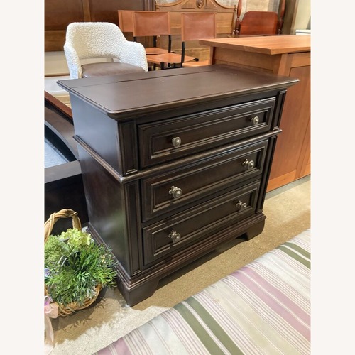 Used Universal Traditional Wood 3-Drawer w Outlet Nightstand for sale on AptDeco