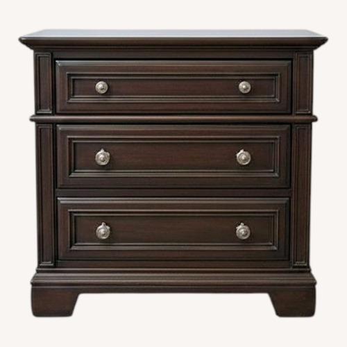 Used Universal Traditional Wood 3-Drawer w Outlet Nightstand for sale on AptDeco