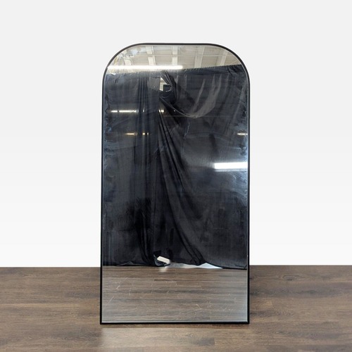 Used Arched Standing Mirror with Metal Frame for sale on AptDeco