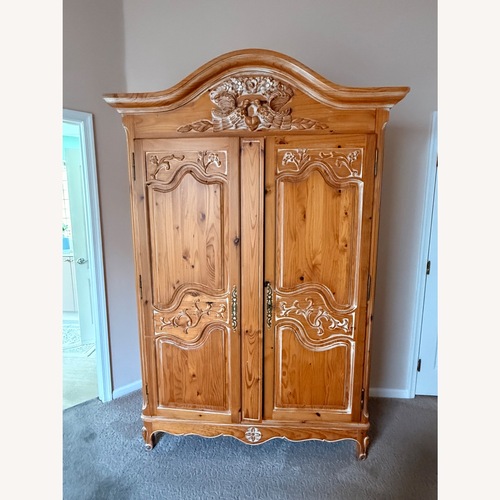 Used Natural Wood Armoire for sale on AptDeco