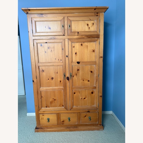 Used Natural Wood Armoire for sale on AptDeco