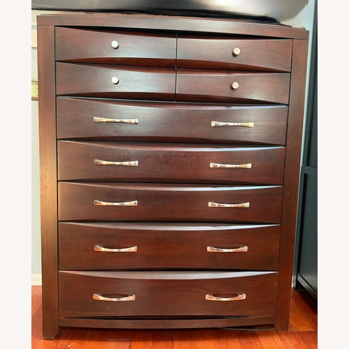 Used Raymour & Flanigan Casana Rodea Tall Wood Dresser for sale on AptDeco