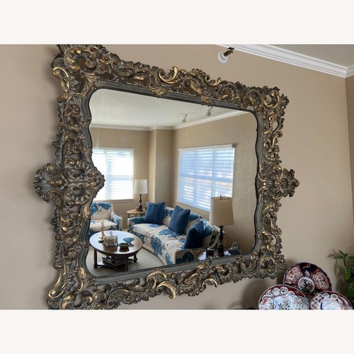 Used Heavily Carved Wall Mirror for sale on AptDeco