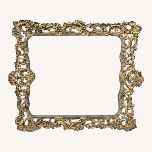 Used Heavily Carved Wall Mirror for sale on AptDeco