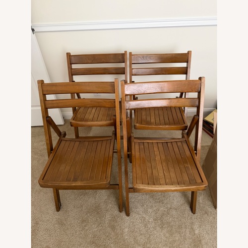 Used Dark Brown Wood Accent Chair for sale on AptDeco