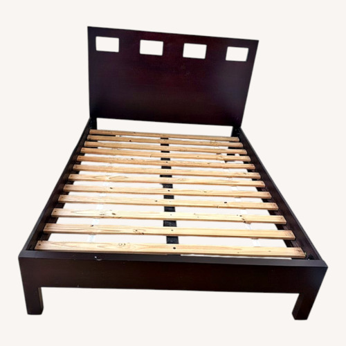 Used Dark Brown Wood Full-Size Bed for sale on AptDeco