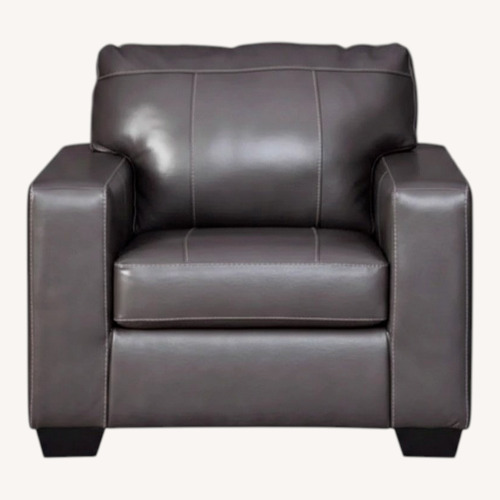Used Ashley Furniture Dark Gray Leather Armchair for sale on AptDeco