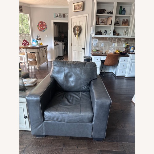 Used Ashley Furniture Dark Gray Leather Armchair for sale on AptDeco