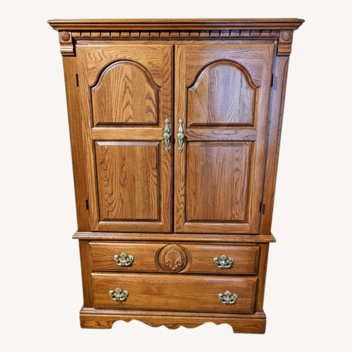 Used Vintage/Antique Natural Wood Armoire for sale on AptDeco