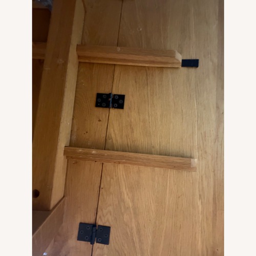 Used IKEA Mockelby Solid Wood Extendable Dining Table for sale on AptDeco