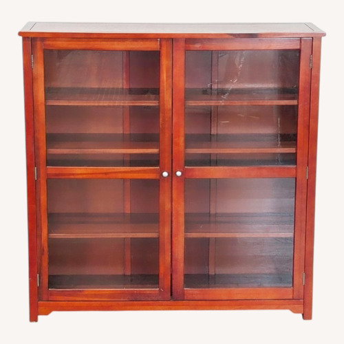 Used Wooden Cabinet with Glass Doors and Shelves for sale on AptDeco