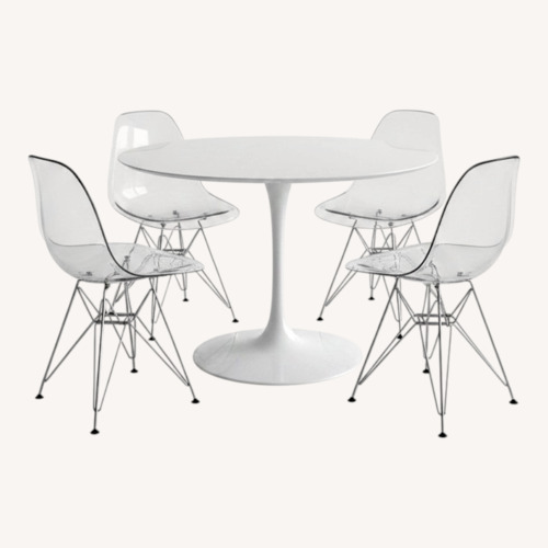Used  Saarinen Table Replica & Eames Replica Chairs for sale on AptDeco