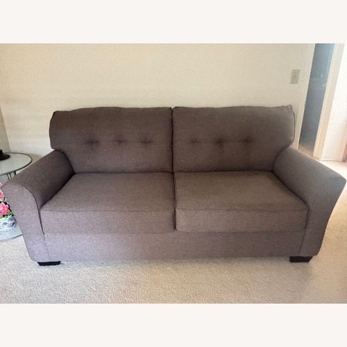 Used Ashley Furniture Tibbee Gray Sleeper Sofa for sale on AptDeco