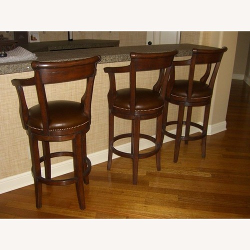 Used Adler & Co. Swivel Bar Stool for sale on AptDeco