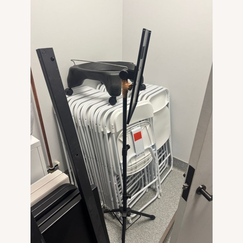 Used Duramax Pack of Eight Meta Folding Chairs for sale on AptDeco