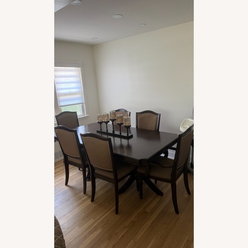 Used Raymour & Flanigan Bay City Studded 7 Piece Dining Set for sale on AptDeco
