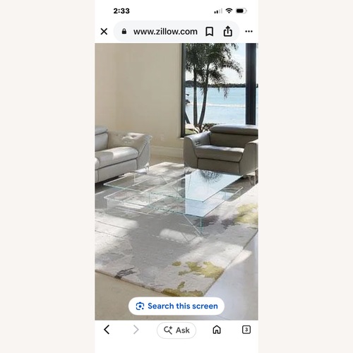 Used Croce Glass Designer Coffee Table for sale on AptDeco