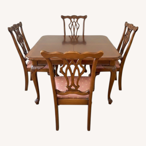 Used Dark Brown Wood Dining Set for sale on AptDeco