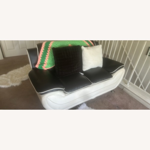 Used Ashley Furniture Black Leather 3+ Seater Sofa for sale on AptDeco