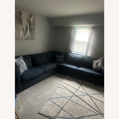 Used Navy Blue Sectional for sale on AptDeco