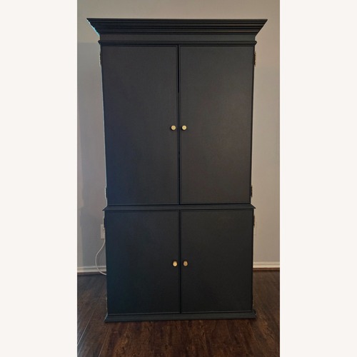 Used Matte Black Armoire for sale on AptDeco