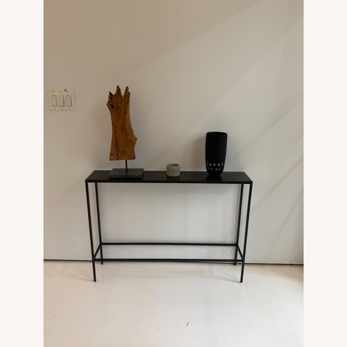 Used Room & Board Slim Black Metal Side Table for sale on AptDeco