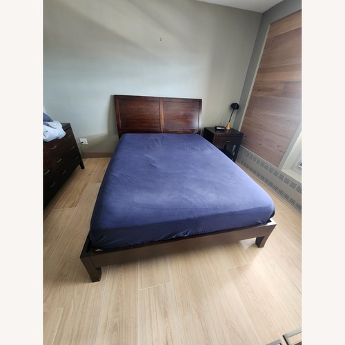 Used Crate & Barrel Dawson Dark Brown Wood Queen Bed for sale on AptDeco