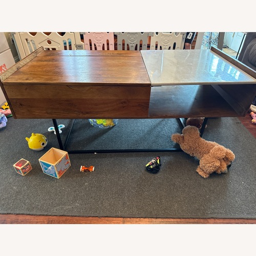 Used Rusitori Lift-Top Coffee Table  for sale on AptDeco
