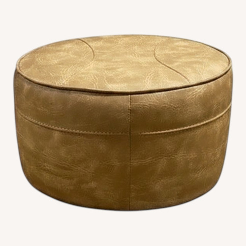 Used Round Tan Faux Leather Ottoman Footstool for sale on AptDeco