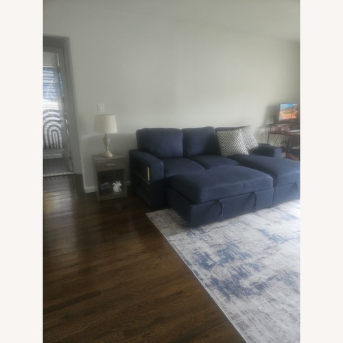 Used Blue 2 Piece Sectional for sale on AptDeco