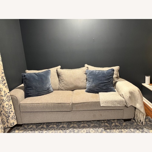 Used Three-seater Beige Microfiber Sofa for sale on AptDeco