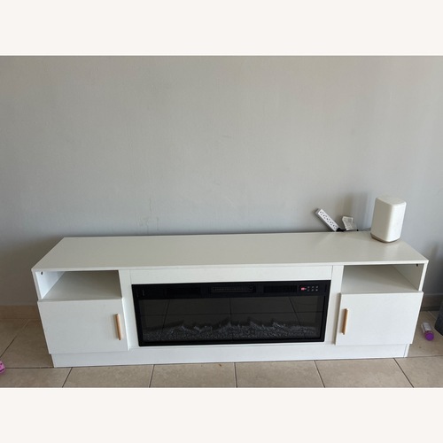 Used Kucreiheat Fireplace TV stand for sale on AptDeco