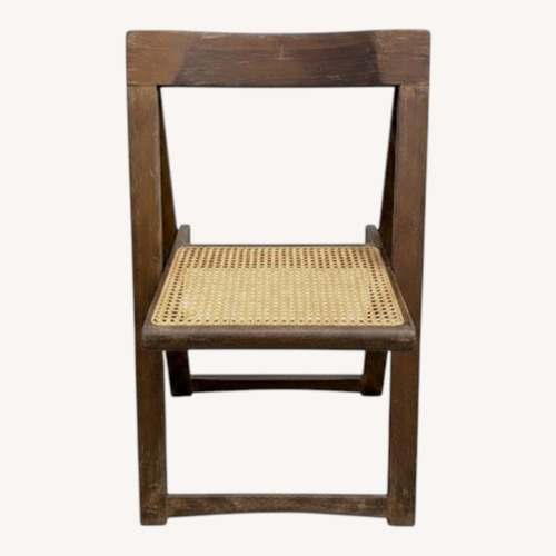 Used Wood Folding Chair Cane Seat Vintage Style for sale on AptDeco