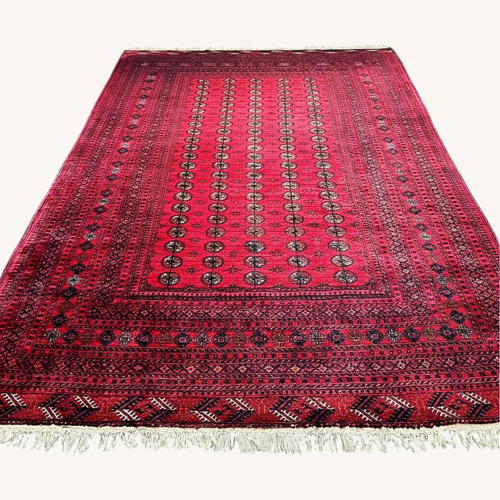 Used Afghani Handwoven Wool Tribal Rug for sale on AptDeco