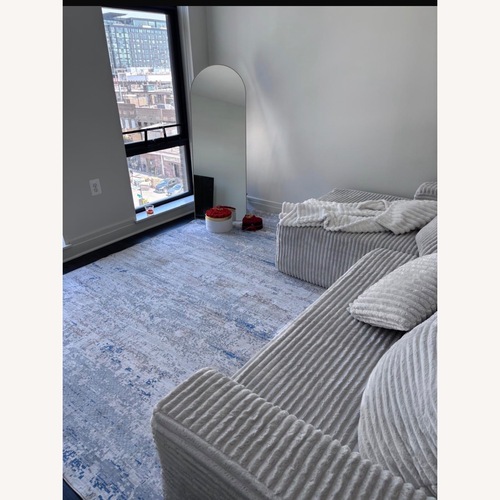 Used Light Gray Fabric 2 Piece Sectional Couch for sale on AptDeco