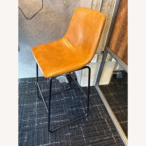 Used Faux Leather Bar Stool on Metal Base	 for sale on AptDeco