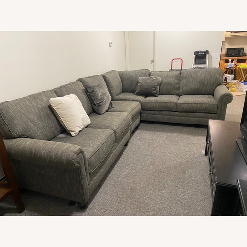Used Ashley Furniture Light Gray 3+ Piece Sectional for sale on AptDeco