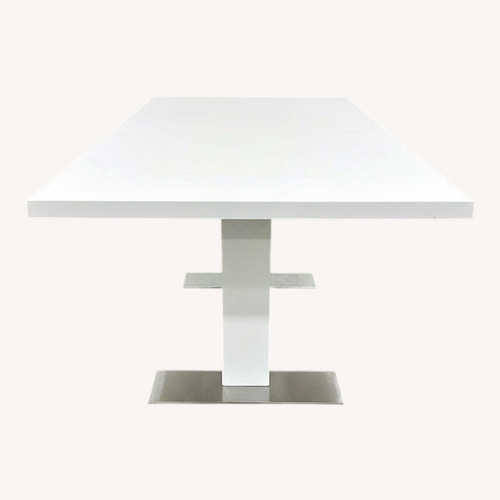 Used Contemporary Gloss W Metallic Feet Dining Table for sale on AptDeco