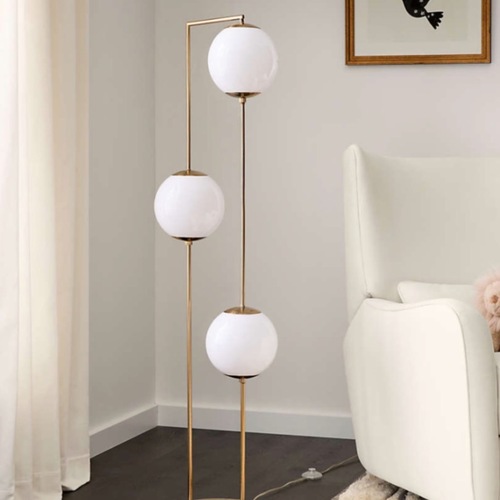 Used Cosmos Gold Metal Kids Floor Lamp for sale on AptDeco