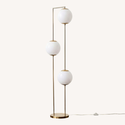 Used Cosmos Gold Metal Kids Floor Lamp for sale on AptDeco