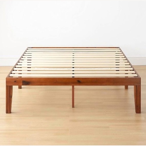 Used Queen-sized Wood Platform Bed Frame with Slats for sale on AptDeco