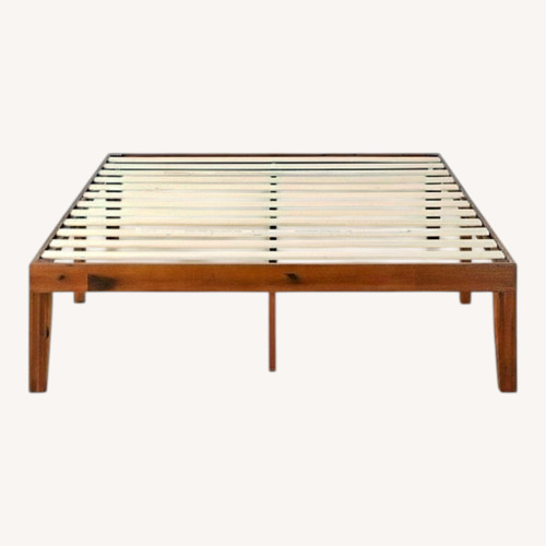 Used Queen-sized Wood Platform Bed Frame with Slats for sale on AptDeco