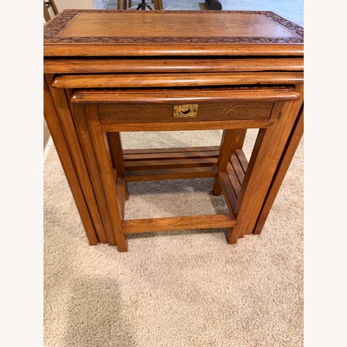 Used Vintage Hand-Carved Hardwood Nesting Tables  for sale on AptDeco