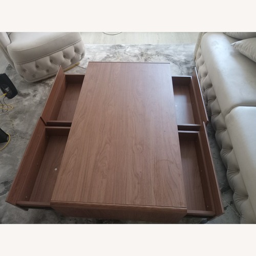 Used Dark Brown Wood Coffee Table for sale on AptDeco