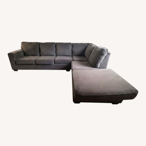 Used Blue Fabric 2 Piece Sectional (Pillows Included) for sale on AptDeco