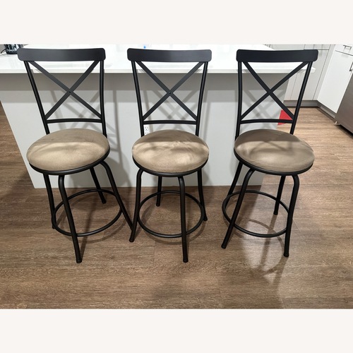 Used Adjustable Height Swivel Barstool for sale on AptDeco